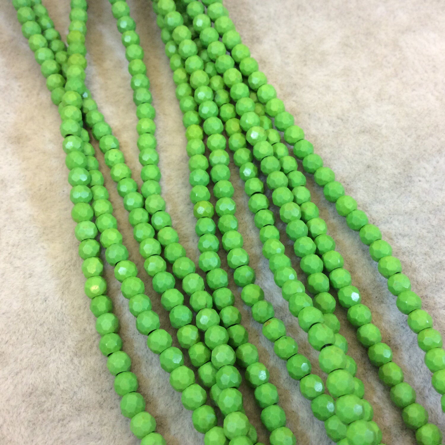 Lime Green Faceted Howlite Beads: 4mm Gemstone Strand