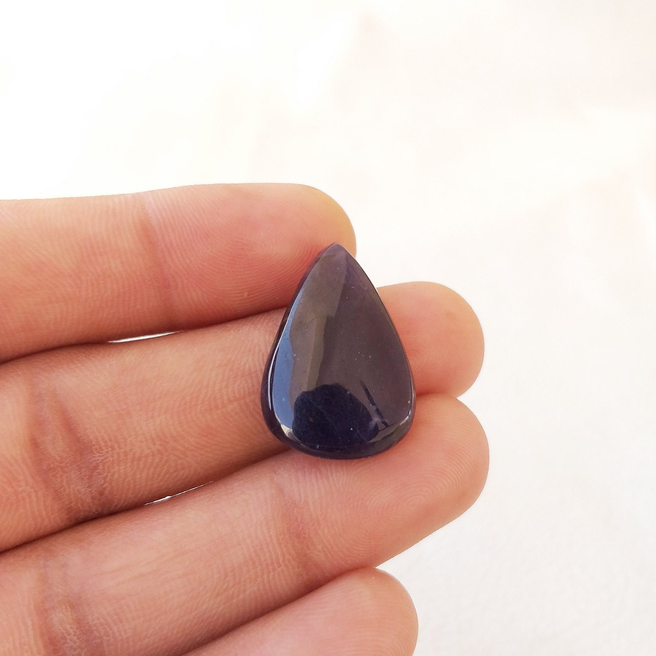 Natural Iolite Pear Cabochon: 14.2 Carat Gemstone, 26x17x5 Mm