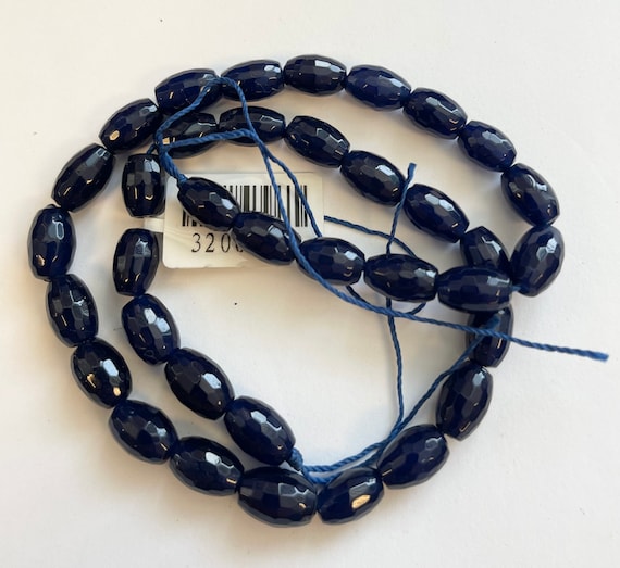 Blue Jade 10x7mm Faceted Oval Gemstone Bead--15.5 Inch Strand Blue Jade 10x7mm Faceted Oval Gemstone Bead--15.5 Inch Strand