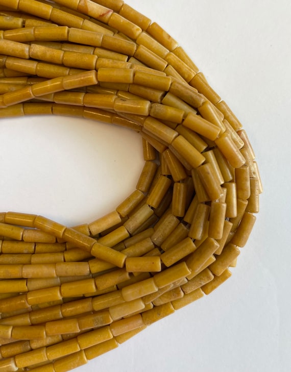 Natural Jade 10x4mm Tube Gemstone Beads--15.5 Inch Strand Natural Jade 10x4mm Tube Gemstone Beads--15.5 Inch Strand