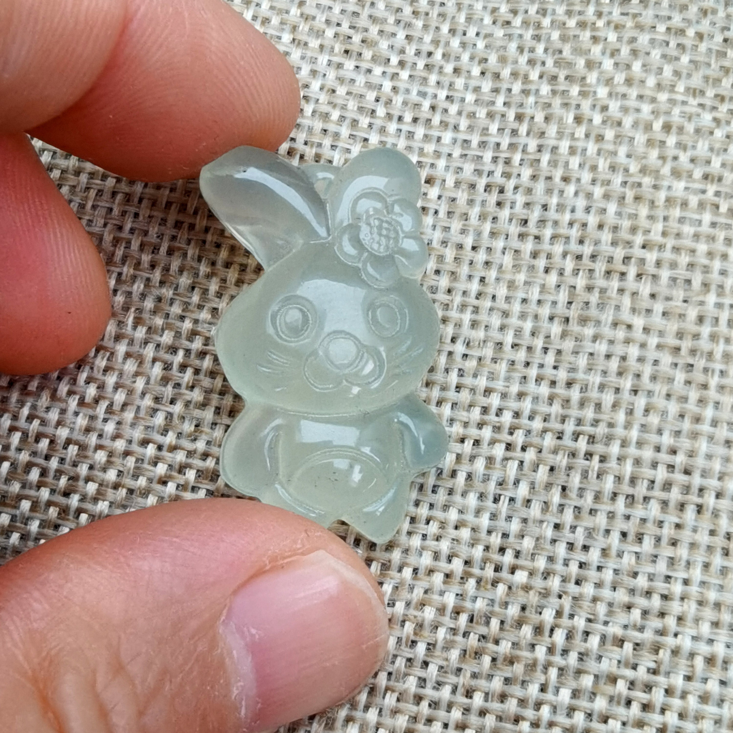 Carved Xiuyan Jade Pendant: Light Green Easter Bunny Amulet