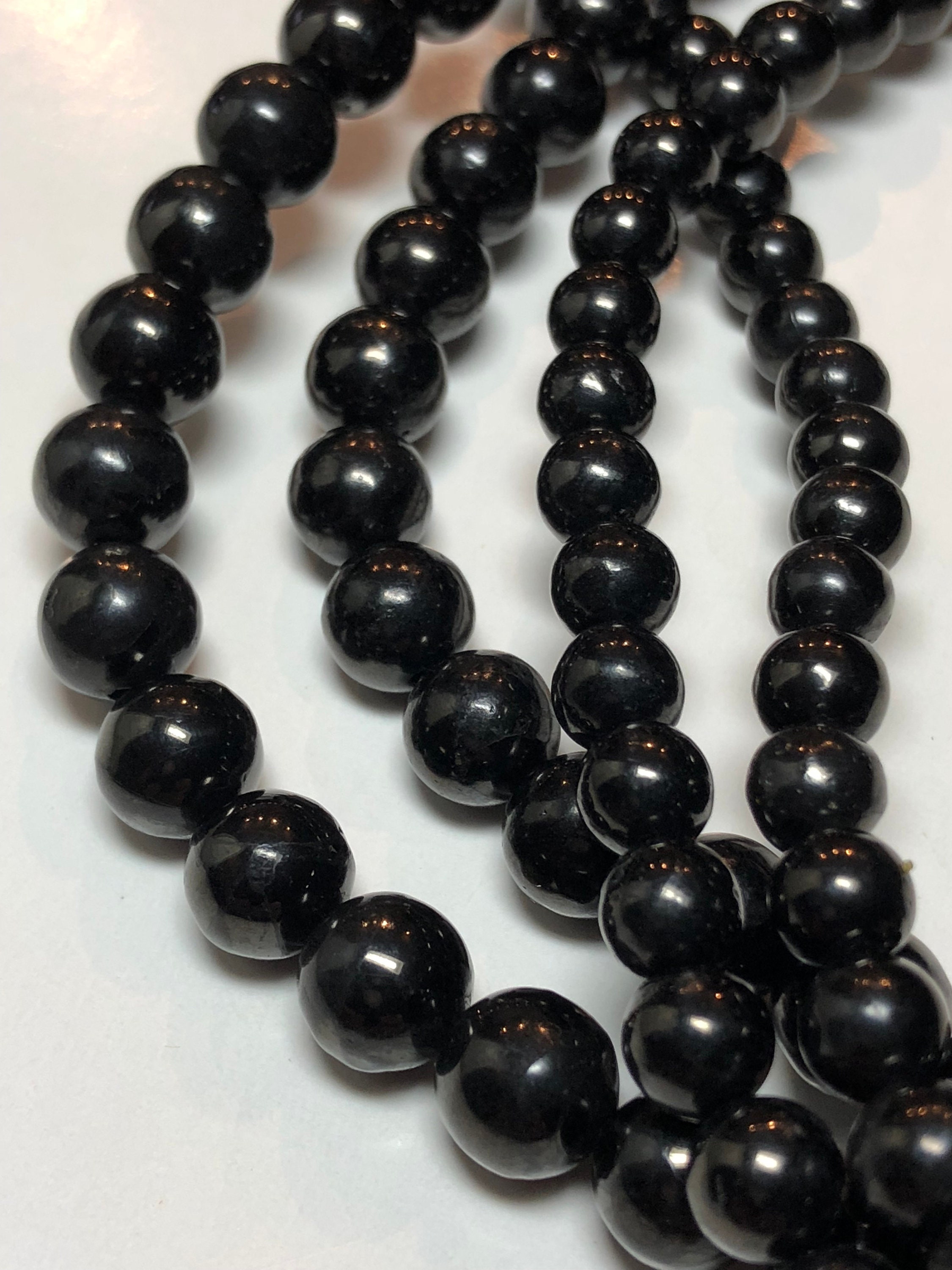 Black Jet (lignite - A Precursor To Coal) Gemstone Beads. 15" Strand Of Round Beads Available In 4-12mm. Light Weight; Organic. Black Jet (lignite - A Precursor To Coal) Gemstone Beads. 15" Strand Of Round Beads Available In 4-12mm. Light Weight; Organic.