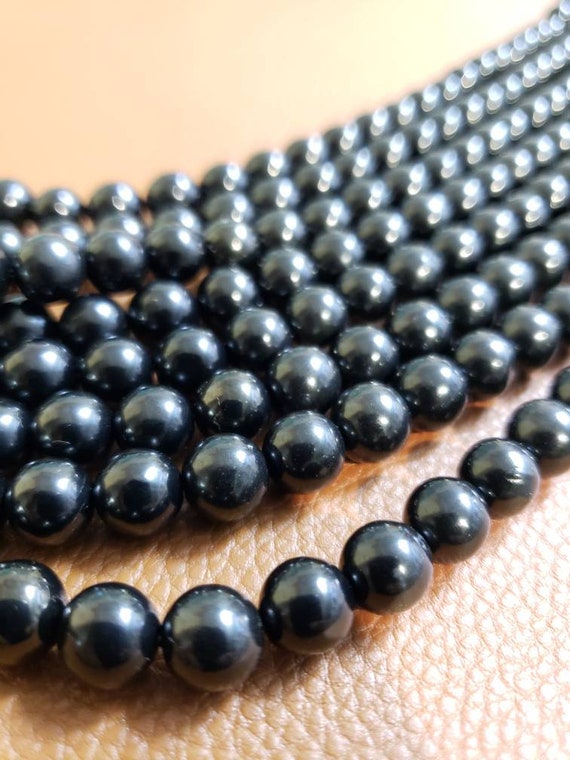 Black Jet Natural Beads (round)(smooth)(8mm)(16"strand)
