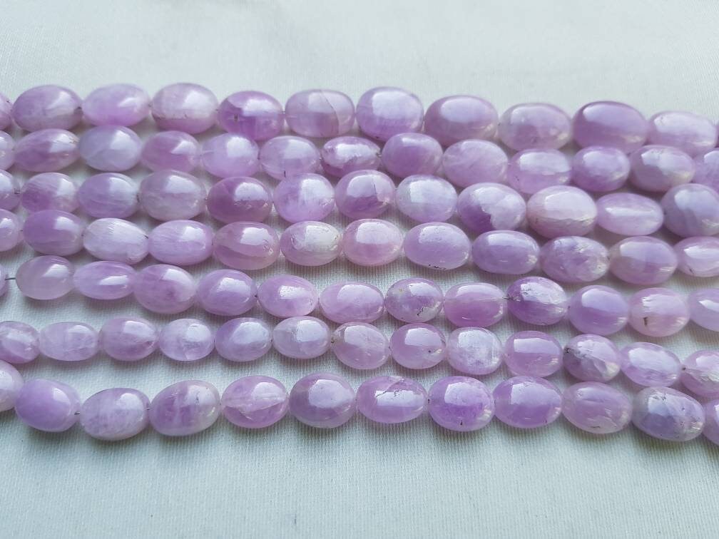 Natural Kunzite Plain Oval (10x7 To 15x12mm): 16 To 18 Beads Per Strand (8")