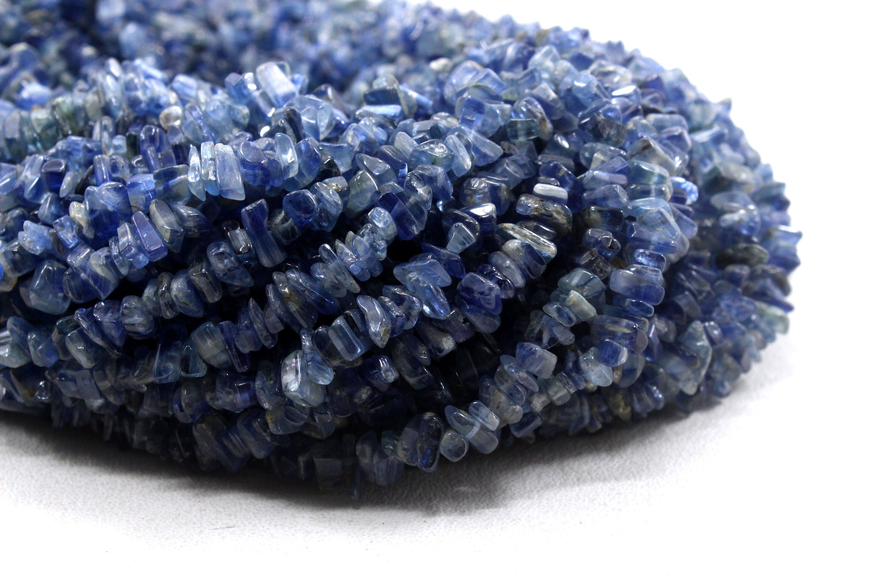16" Kyanite Gemstone Beads: 5-7mm Smooth Uncut Chips, Center Drilled