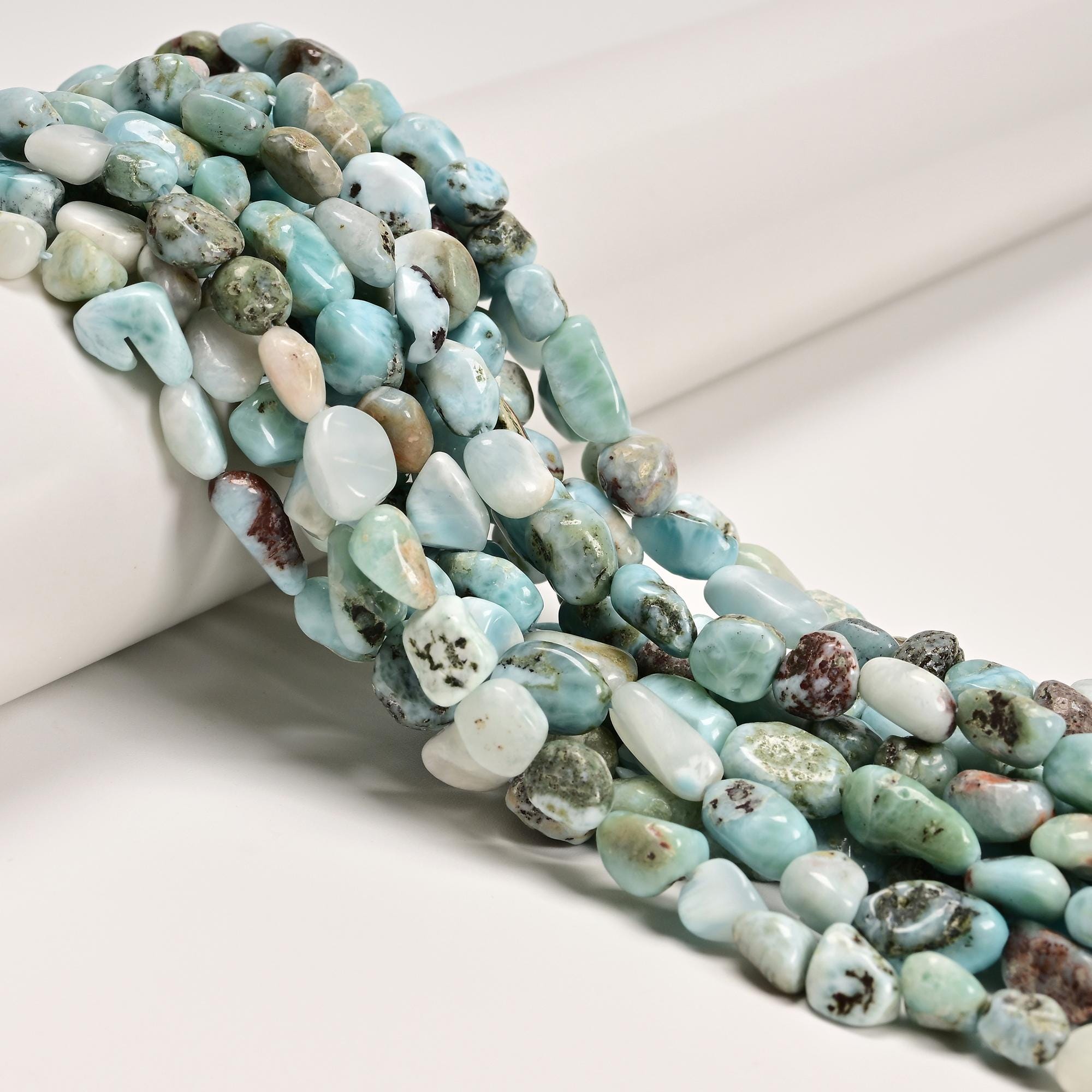 Natural Larimar Side Drill Nugget Beads Size 5x8mm 15.5" Strand Natural Larimar Side Drill Nugget Beads Size 5x8mm 15.5" Strand