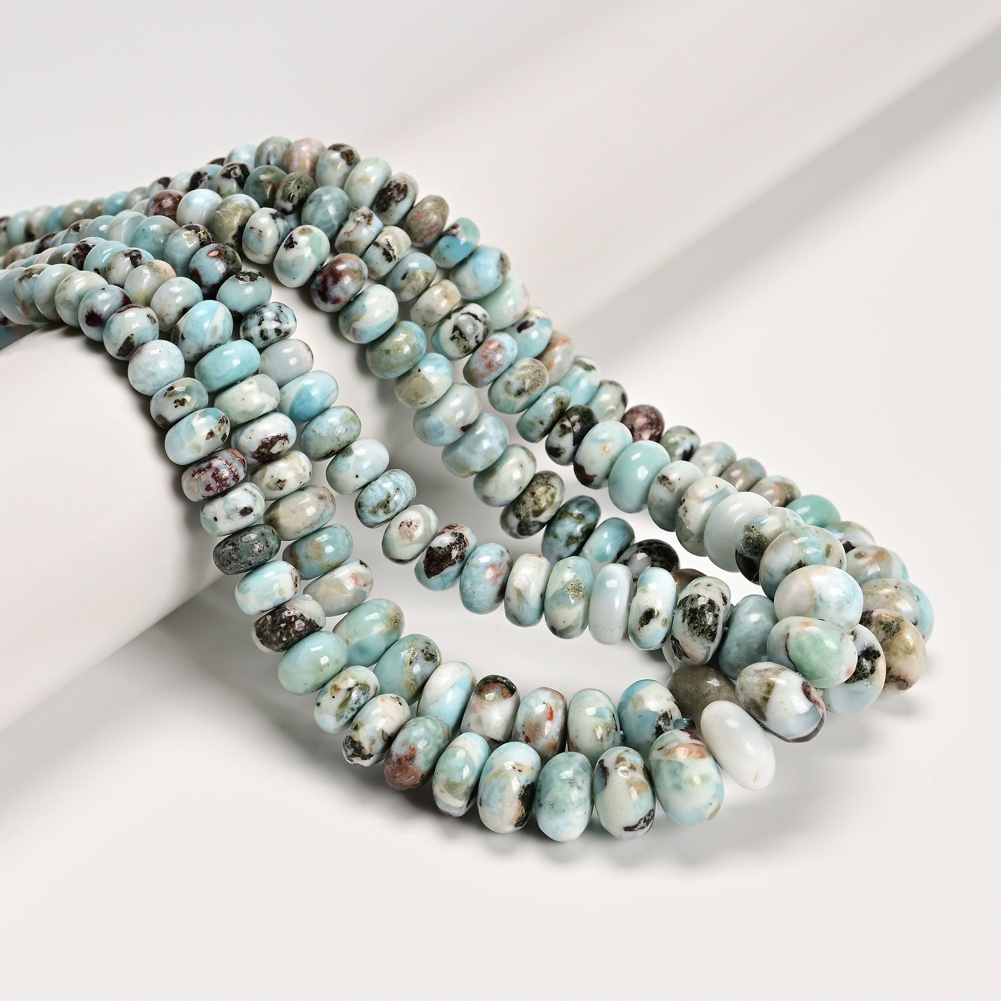 Natural Multi Color Larimar Graduated Smooth Rondelle Beads 4x6-8x12mm 15.5''std Natural Multi Color Larimar Graduated Smooth Rondelle Beads 4x6-8x12mm 15.5''std