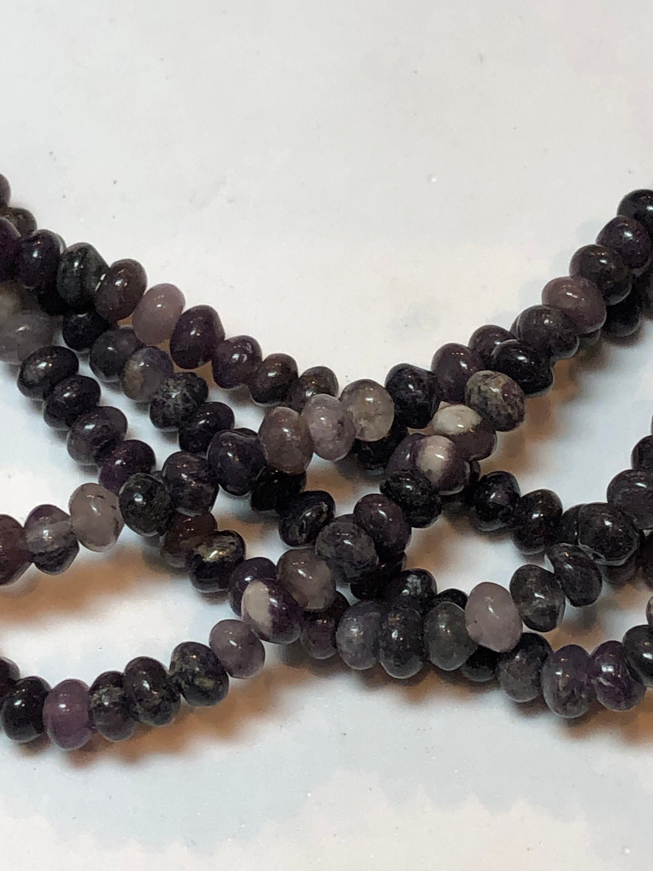 4mm Rondelle Dark Lepidolite Gemstone Beads. Full 15" Strand Of A Grade Rondelle Beads. It's A Form Of Mica And A Lithium Bearing Mineral.