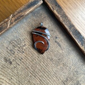 Faceted mahogany obsidian in sterling silver pendant