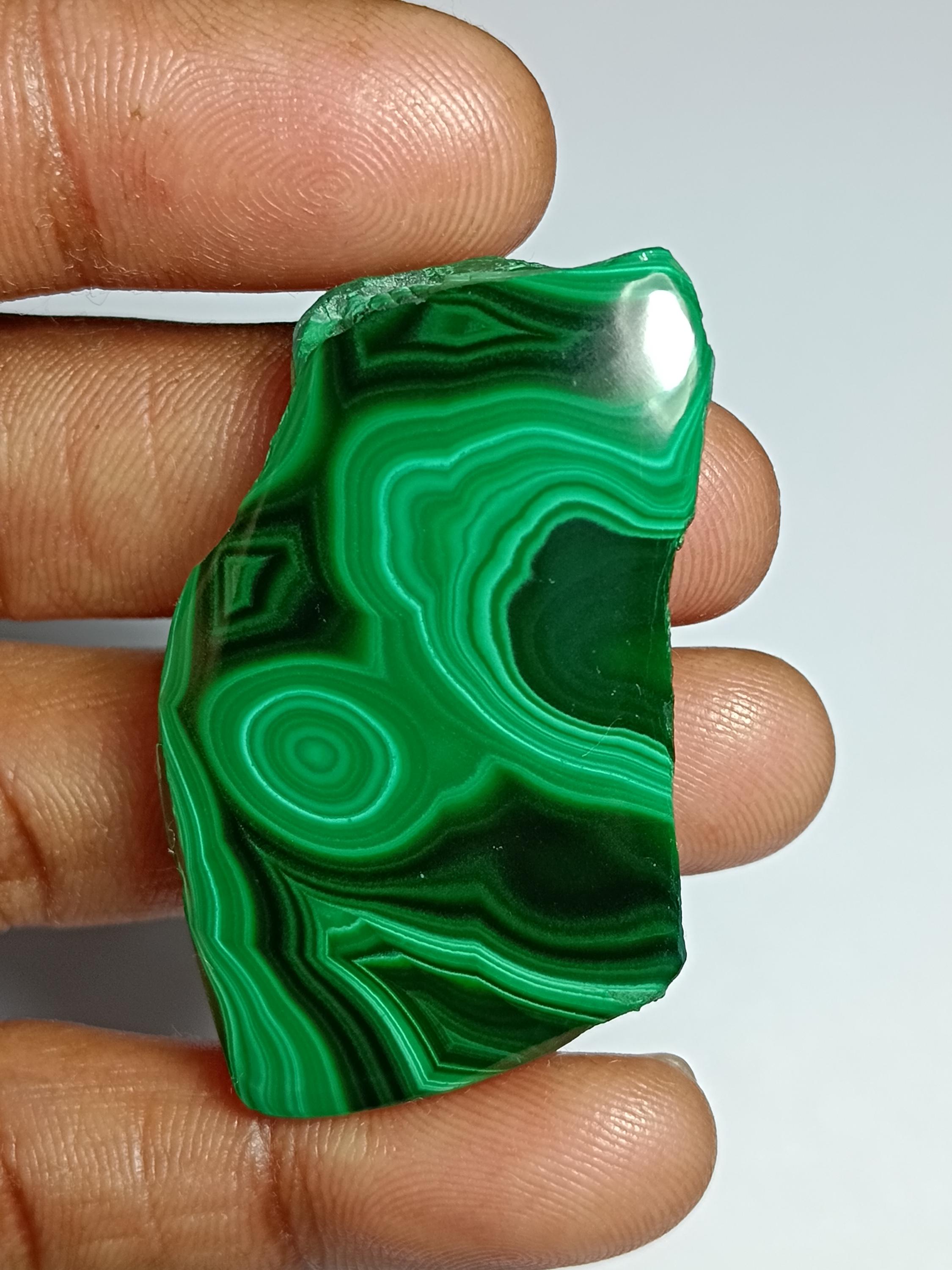 Malachite Slice Cabochon: Loose Gemstone, 139cts. 42x26mm. Malachite Slice Cabochon: Loose Gemstone, 139cts. 42x26mm.
