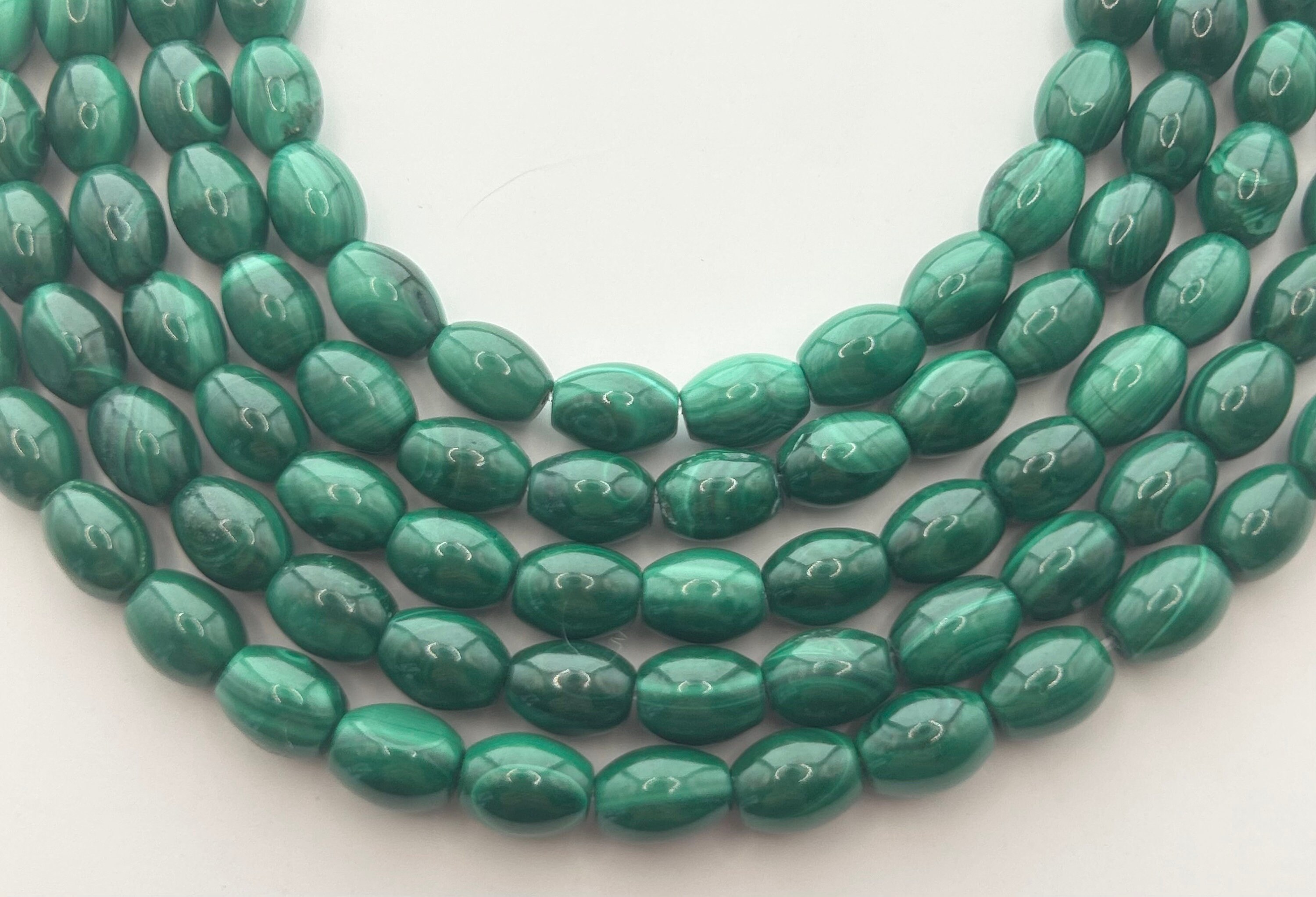 6x8mm Rice Malachite Gemstone Beads. Full 15" Strand Of Banded Green Malachite Beads, Approx. 48 Per Strand. 6x8mm Rice Malachite Gemstone Beads. Full 15" Strand Of Banded Green Malachite Beads, Approx. 48 Per Strand.