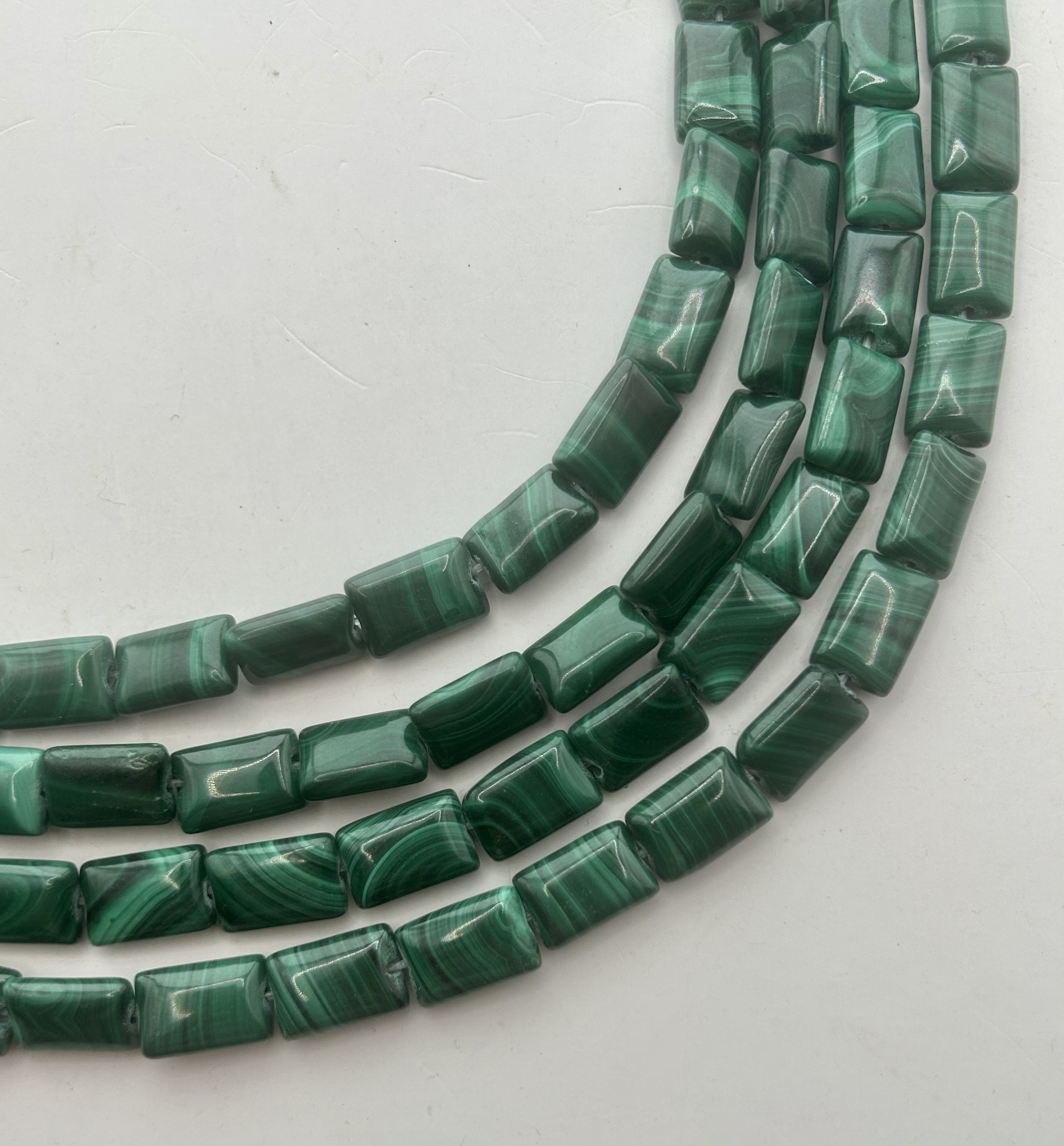 8x12mm Flat Rectangle Malachite Gemstone Beads. Full 15" Strand Of Banded Green Malachite Pillow Shaped Beads, Approx. 33 Per Strand. 8x12mm Flat Rectangle Malachite Gemstone Beads. Full 15" Strand Of Banded Green Malachite Pillow Shaped Beads, Approx. 33 Per Strand.