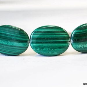 Malachite 22x30mm/ 25x35mm Flat Oval Beads 15.5" Strand Malachite 22x30mm/ 25x35mm Flat Oval Beads 15.5" Strand