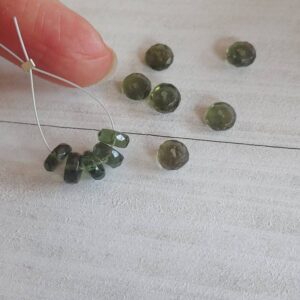 Authentic moldavite rondelle faceted beads. Tektite beads. 3x7mm beads. This listing is for 5 beads