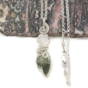 Raw Phenakite Crystal and Moldavite Pendant in Sterling Silver Wire w/FREE 18" Sterling Silver Chain -- SUPER clarity in this amazing combo! Raw Phenakite Crystal and Moldavite Pendant in Sterling Silver Wire w/FREE 18" Sterling Silver Chain -- SUPER clarity in this amazing combo!