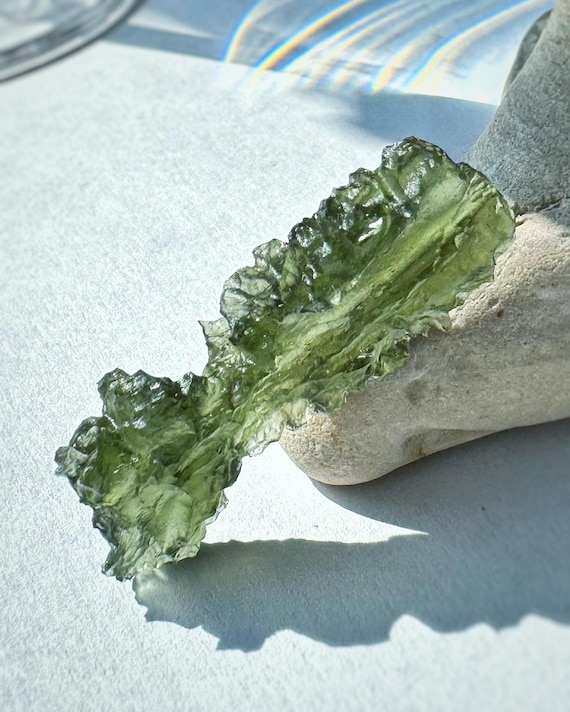 Ježkovna Moldavite: 3.9g Rough Green Talisman With Certificate Ježkovna Moldavite: 3.9g Rough Green Talisman With Certificate