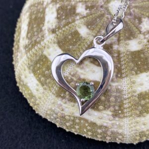 Heart Signature! A 6mm Round Genuine Faceted Moldavite Cradled In A Sterling Silver Rhodium Plated Heart