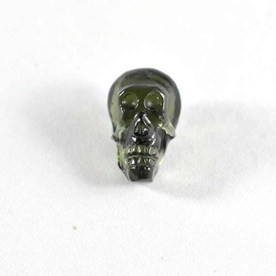 Natural Moldavite Skull Carving, Czech Republic Gemstone (8.8 Ct) Natural Moldavite Skull Carving, Czech Republic Gemstone (8.8 Ct)