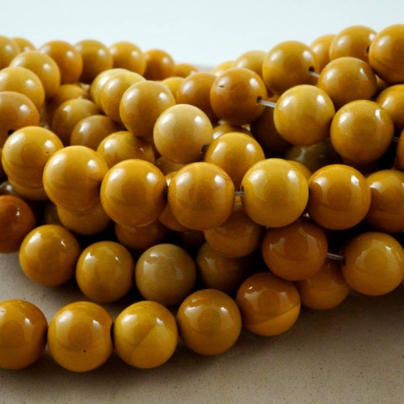 Yellow Mookaite Beads (round)(smooth)(4mm)(6mm)(8mm)(10mm)(16"strand)