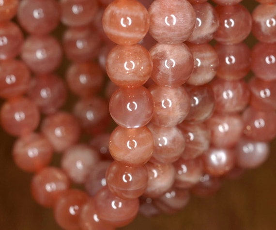 11mm Orange Moonstone Gemstone Grade Ab Round 11mm Loose Beads 7 Inch Half Strand Lot 1,2, And 6 (90186786-820) 11mm Orange Moonstone Gemstone Grade Ab Round 11mm Loose Beads 7 Inch Half Strand Lot 1,2, And 6 (90186786-820)