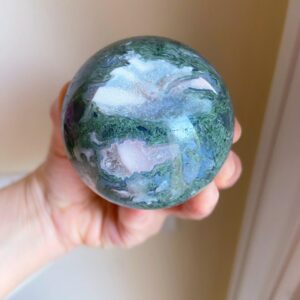 Moss Agate Sphere With Sparkly Druzy Center Cave