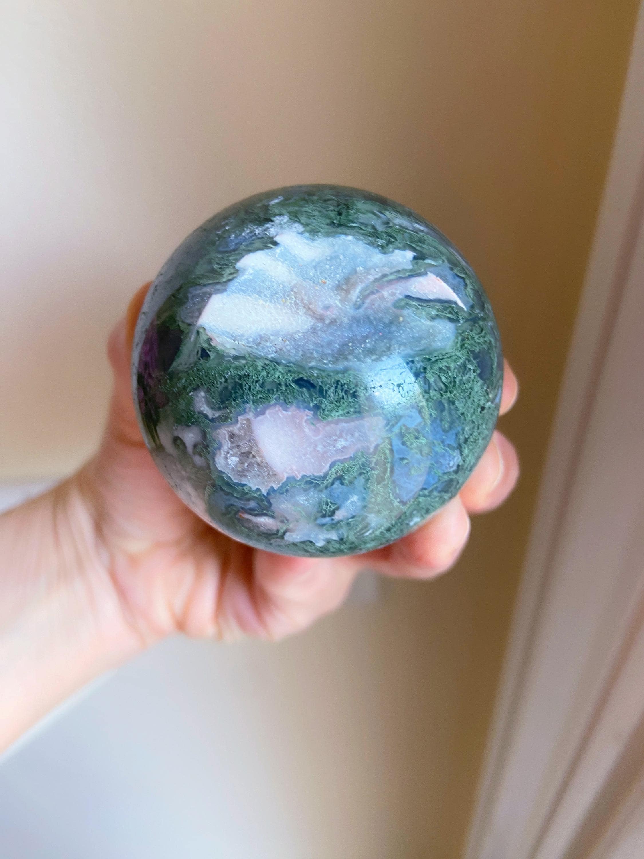 Moss Agate Sphere With Sparkly Druzy Center Cave
