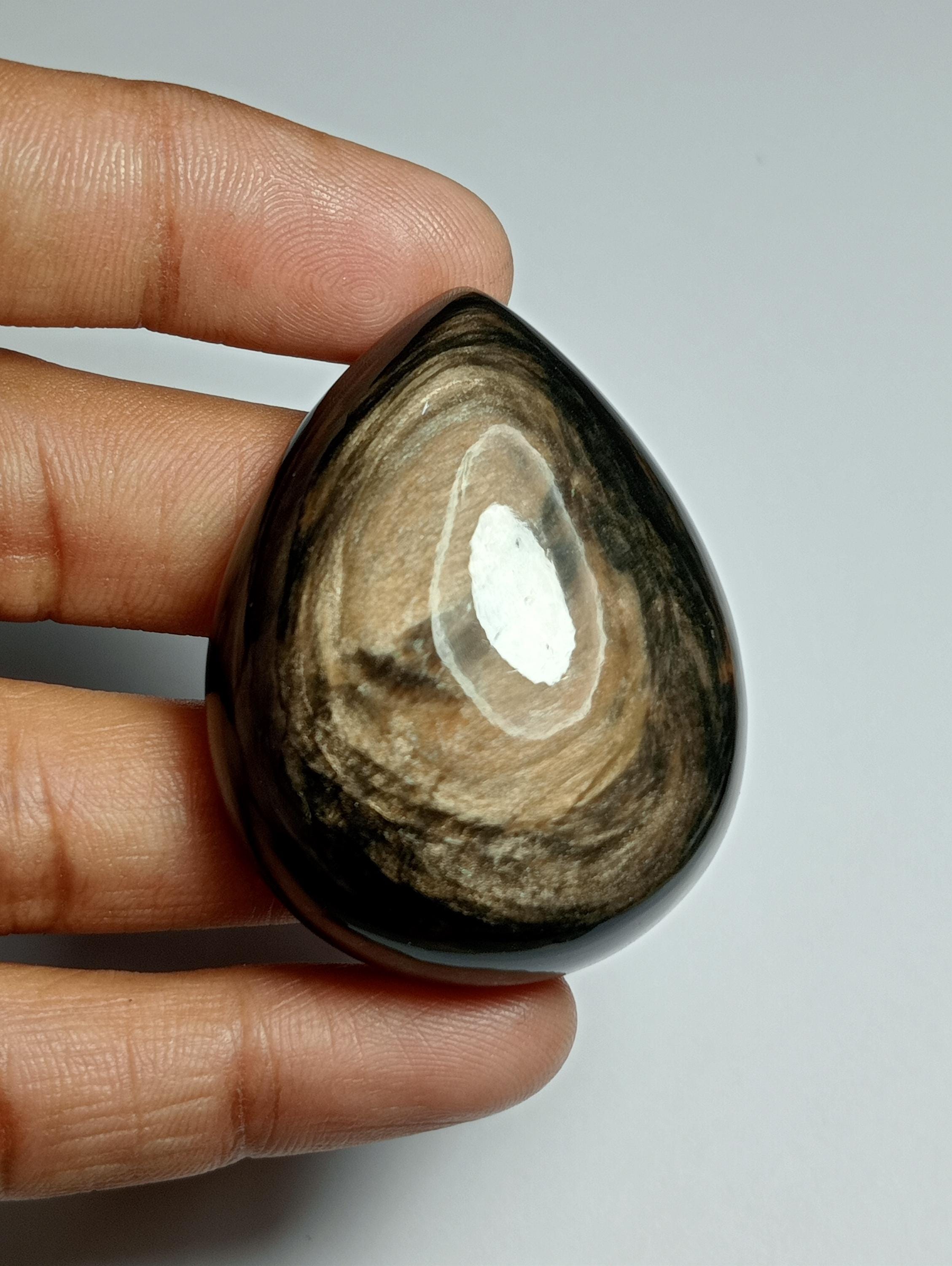 Natural Fire Sheen Obsidian Cabochon, Loose Gemstone (46x36 Mm, 166cts) Natural Fire Sheen Obsidian Cabochon, Loose Gemstone (46x36 Mm, 166cts)