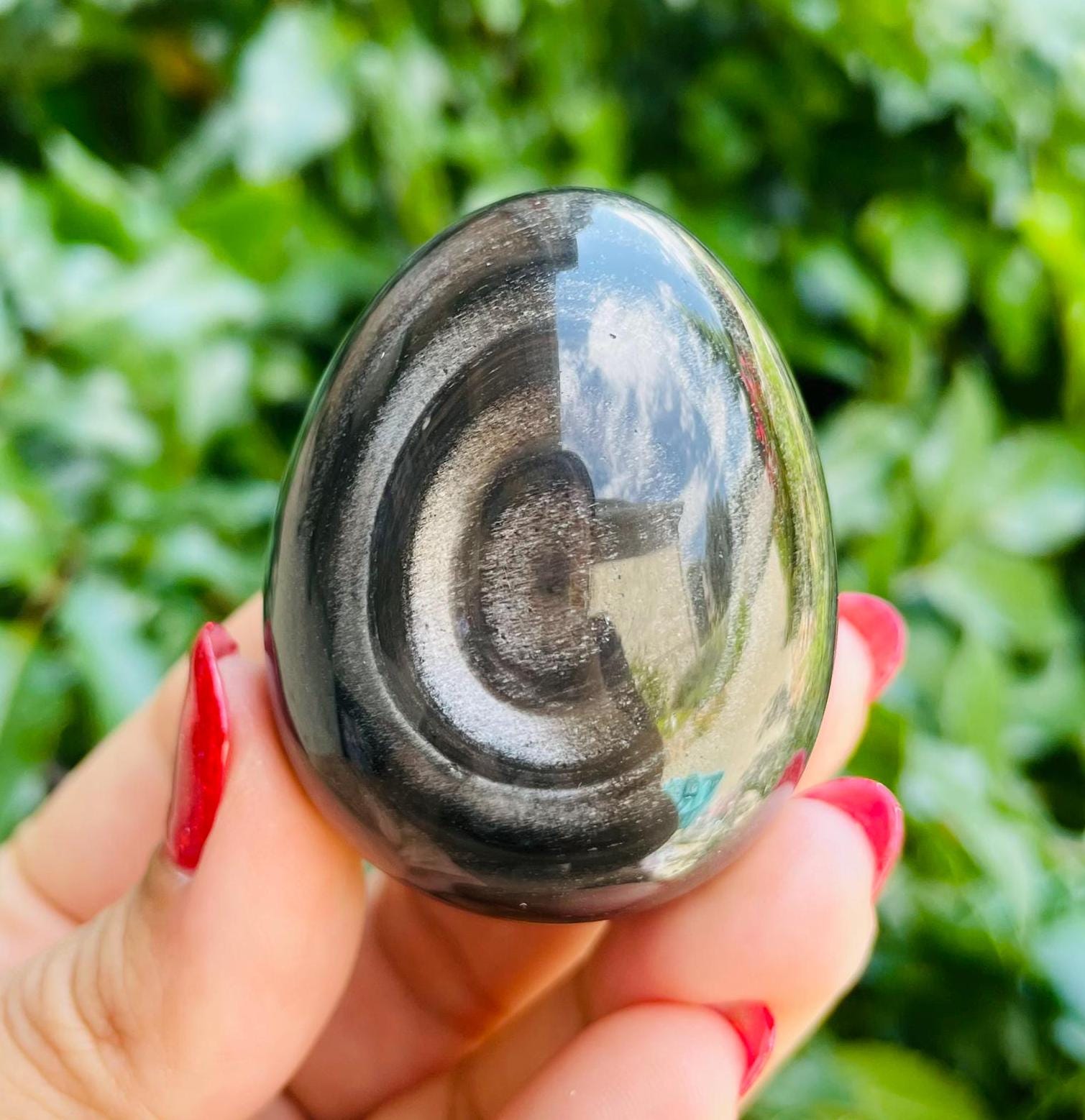 Ringed Silver Sheen Obsidian Egg: Polished Black Crystal (97.1g) Ringed Silver Sheen Obsidian Egg: Polished Black Crystal (97.1g)