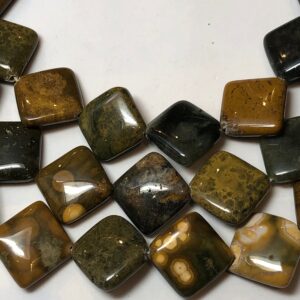 16mm diagonal-drilled square Ocean Jasper gemstone beads. Full 15" strand of flat square beads, approx. 21 beads per strand. 16mm diagonal-drilled square Ocean Jasper gemstone beads. Full 15" strand of flat square beads, approx. 21 beads per strand.