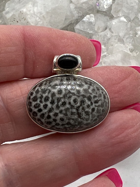 Stingray Coral And Black Onyx Pendant