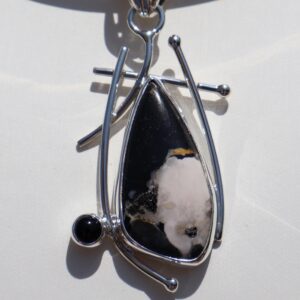 WHITE BUFFALO STONE Pendant, With Black Onyx Accent, unique Sterling Silver Design WHITE BUFFALO STONE Pendant, With Black Onyx Accent, unique Sterling Silver Design