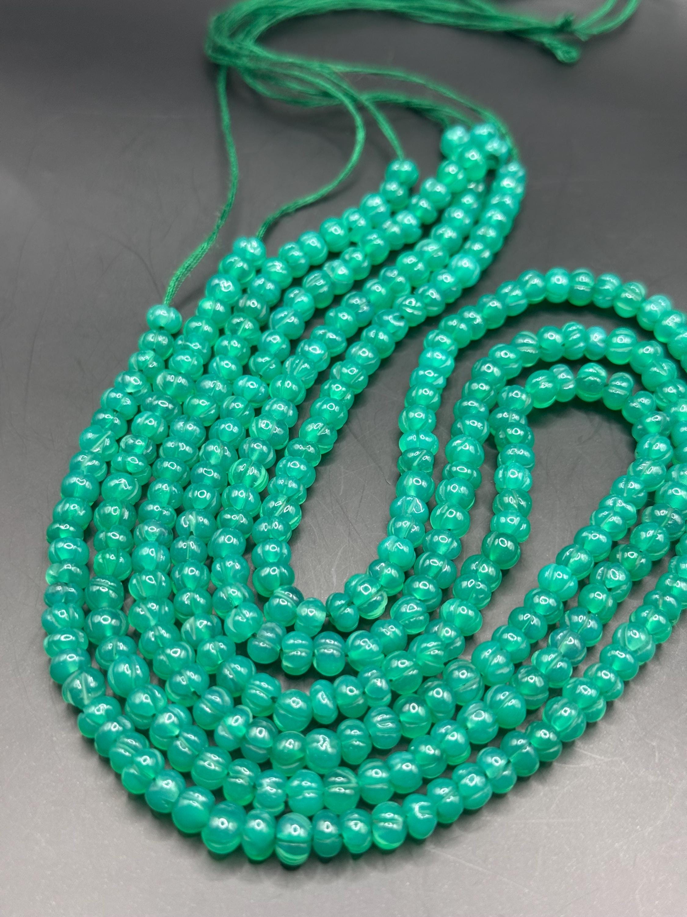 1/2 Strand Small Carved Green Onyx Roundels