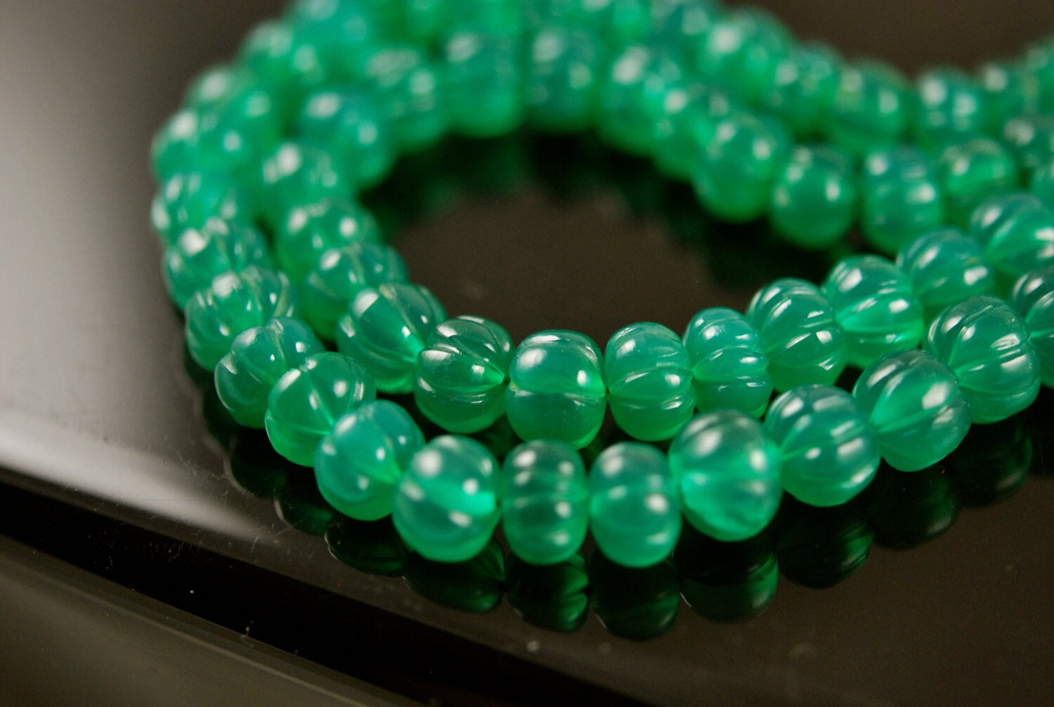 1/2 Strand Carved Green Onyx Roundels
