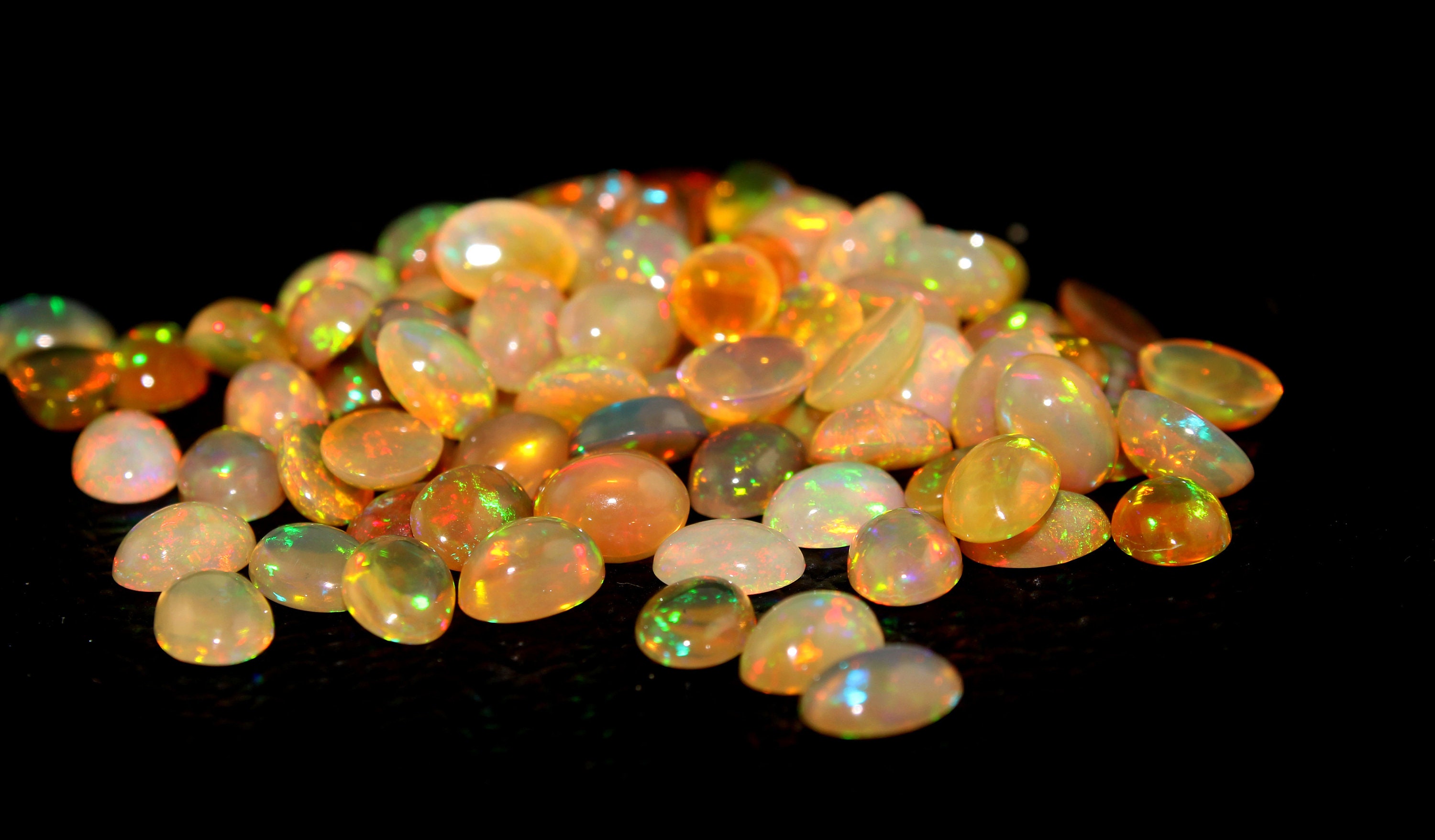 5 Ethiopian Opal Cabochons: Calibrated Oval Fire Opal Gemstones (5x7 Mm) 5 Ethiopian Opal Cabochons: Calibrated Oval Fire Opal Gemstones (5x7 Mm)