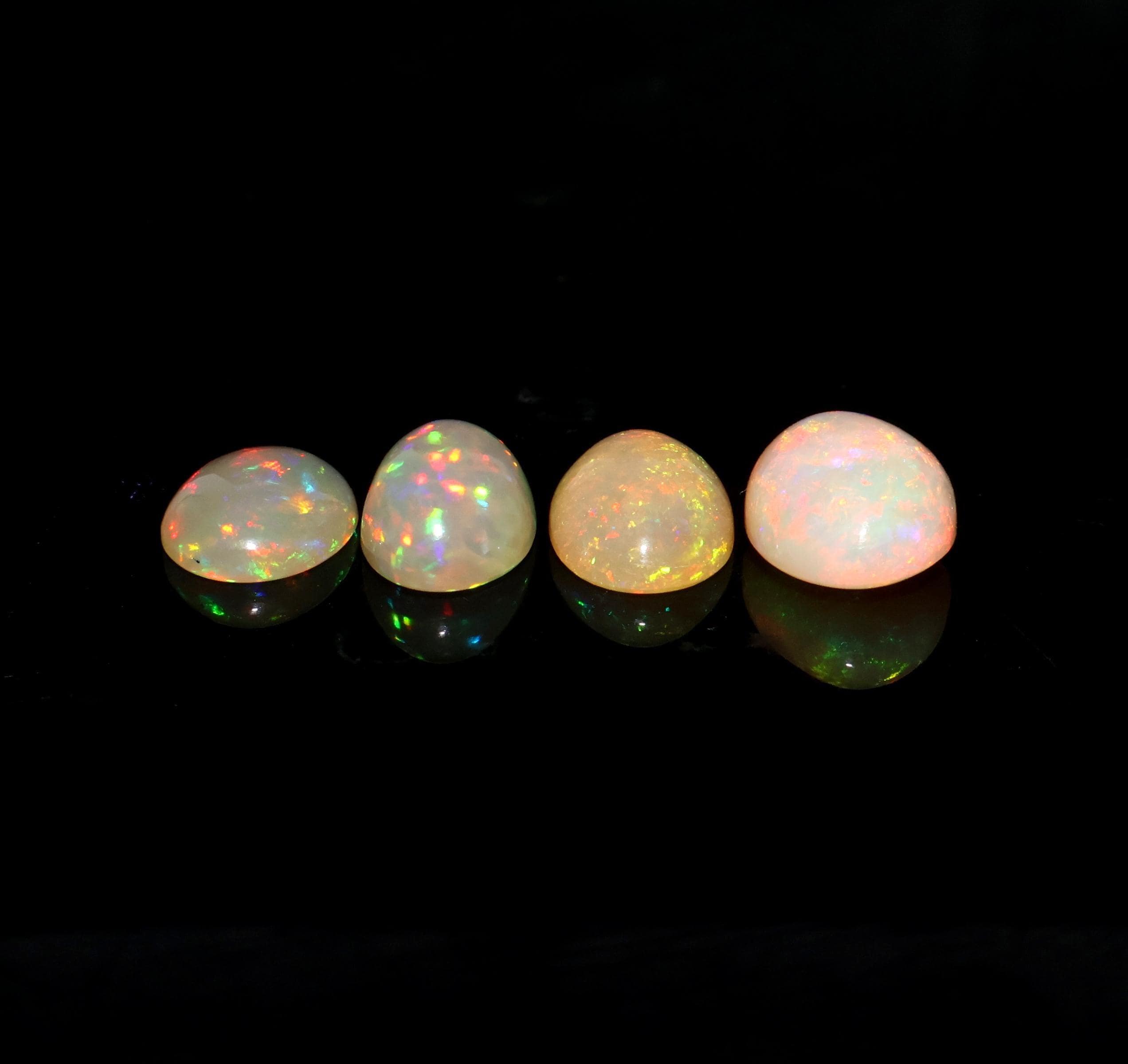 7.65 Carat Ethiopian Opal Cabochon Lot, Multi Fire Gemstone, 4 Pcs 7.65 Carat Ethiopian Opal Cabochon Lot, Multi Fire Gemstone, 4 Pcs