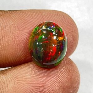 Black Ethiopian Opal Cabochon: Smocked Oval Gemstone With Flashy Fire (5.85ct)