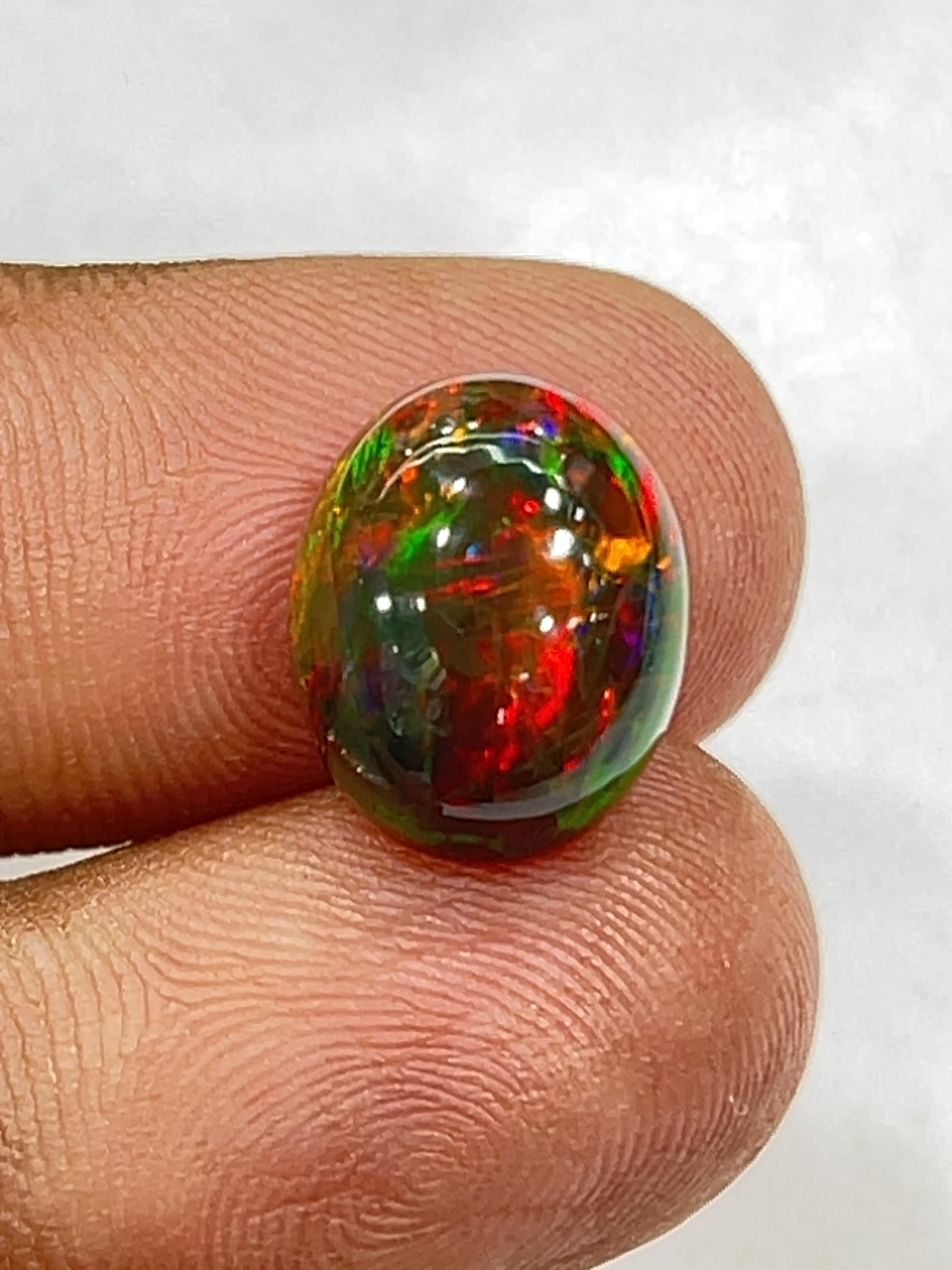 Black Ethiopian Opal Cabochon: Smocked Oval Gemstone With Flashy Fire (5.85ct)