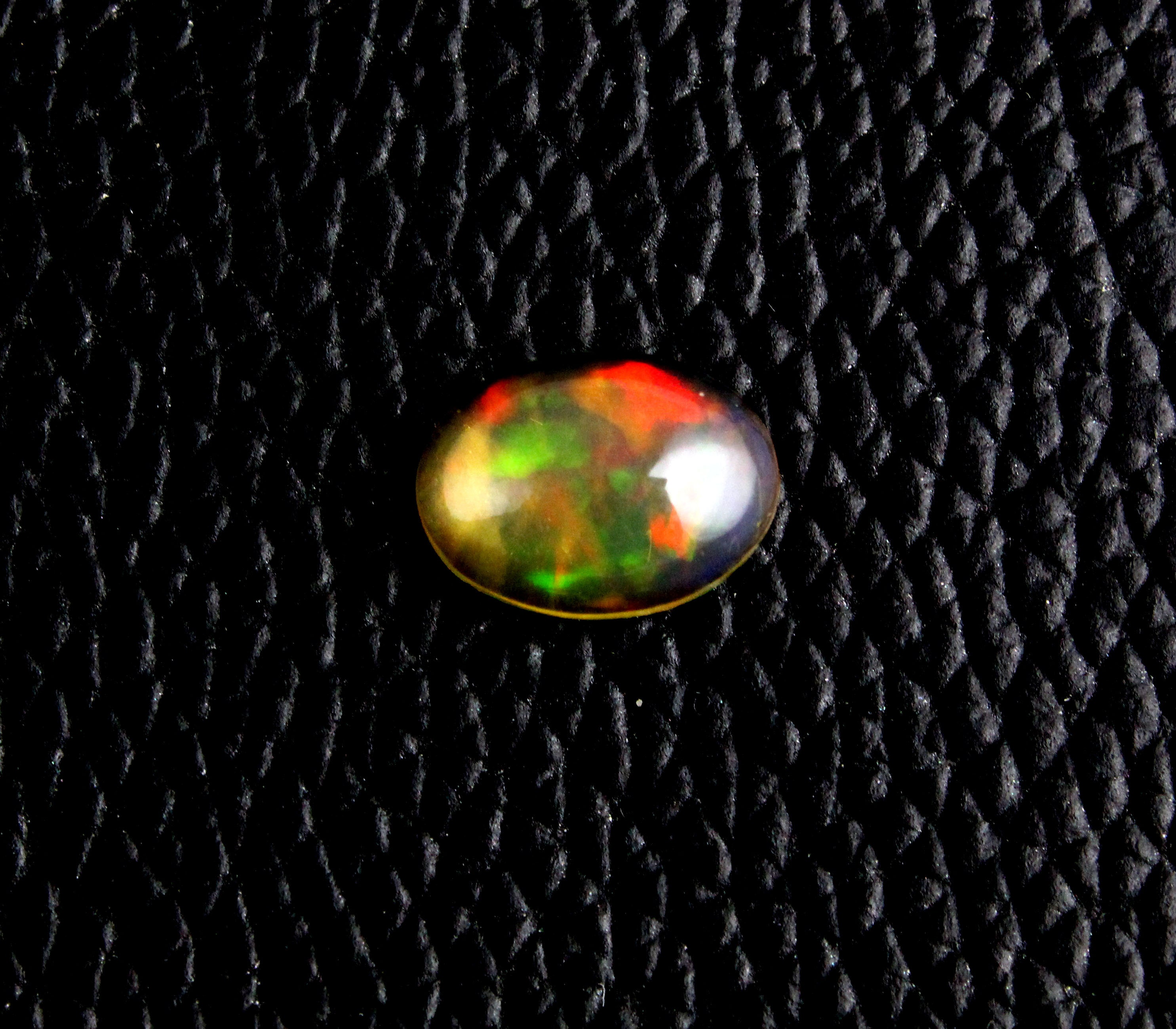 Ethiopian Opal Cabochon: Oval Fire Opal Gemstone (8.5x11.5 Mm)