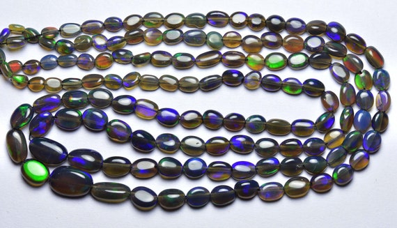 Ethiopian Opal Nugget Beads - 16 Inches - Rare Natural Smooth Super Quality Blue Fire Ethiopian Opal Oval Shape Beads - Size Is 5-8 Mm #1837 Ethiopian Opal Nugget Beads - 16 Inches - Rare Natural Smooth Super Quality Blue Fire Ethiopian Opal Oval Shape Beads - Size Is 5-8 Mm #1837