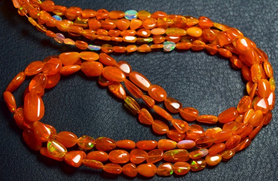 Orange Ethiopian Opal Nugget Beads - 18.5 Inches - High Quality Natural Smooth Flashy Orange Ethiopian Opal Nuggets - Size Is 4-9 Mm #1848 Orange Ethiopian Opal Nugget Beads - 18.5 Inches - High Quality Natural Smooth Flashy Orange Ethiopian Opal Nuggets - Size Is 4-9 Mm #1848