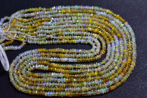 Beautiful Ethiopian Opal Beads - 14 Inches - Natural Faceted Flashy Ethiopian Opal Rondelle Beads - Size Is 3 -3.5 Mm #2110 Beautiful Ethiopian Opal Beads - 14 Inches - Natural Faceted Flashy Ethiopian Opal Rondelle Beads - Size Is 3 -3.5 Mm #2110