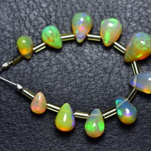 Superb Ethiopian Opal Teardrop Beads - 10 Pcs - Natural Smooth Ethiopian Welo Opal Tear drop Briolette - Size is 5x7 - 6.5x10 mm #266 Superb Ethiopian Opal Teardrop Beads - 10 Pcs - Natural Smooth Ethiopian Welo Opal Tear drop Briolette - Size is 5x7 - 6.5x10 mm #266