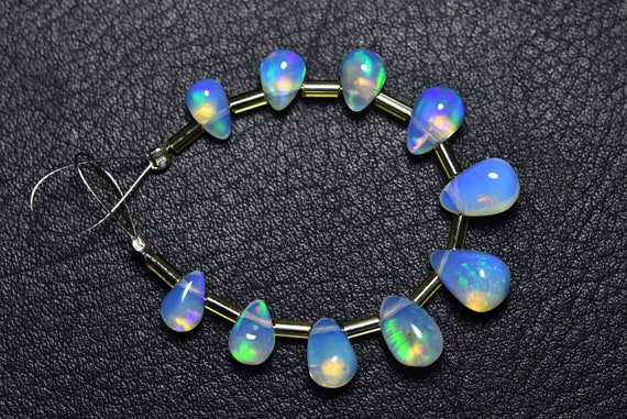 Superb Flashy Ethiopian Opal Teardrop Beads - 10 Pcs - Natural Smooth Ethiopian Welo Opal Tear Drop Briolette - Size Is 4x6 - 6x9 Mm #121 Superb Flashy Ethiopian Opal Teardrop Beads - 10 Pcs - Natural Smooth Ethiopian Welo Opal Tear Drop Briolette - Size Is 4x6 - 6x9 Mm #121