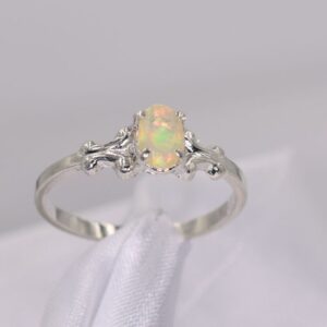Opal Ring, Genuine Ethiopian Honey Color Opal 6x4 mm Faceted Opal .32 carats, October Birthstone, Set in 925 Sterling Silver Fancy Mounting Opal Ring, Genuine Ethiopian Honey Color Opal 6x4 mm Faceted Opal .32 carats, October Birthstone, Set in 925 Sterling Silver Fancy Mounting