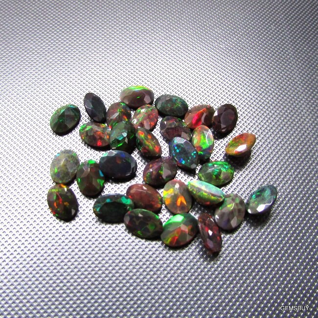 Faceted Black Ethiopian Opal: Aaa Oval Loose Gemstone (5x7mm)