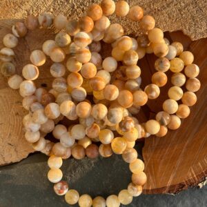 Orange calcite crystal bead bracelet 12mm stretchy