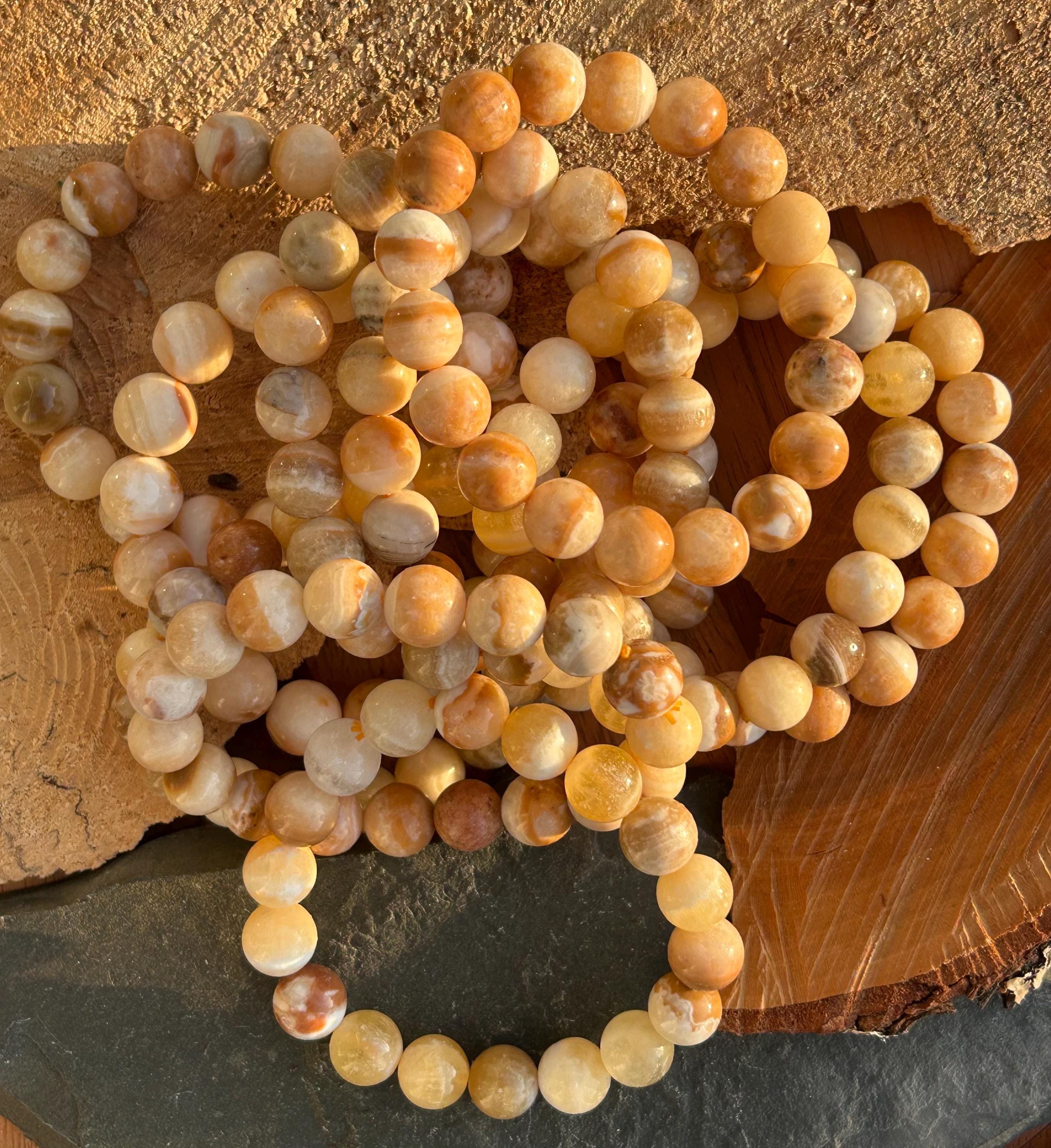 Orange Calcite Crystal Bead Bracelet 12mm Stretchy