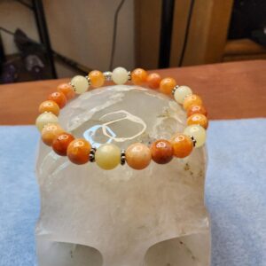 Calcite- yellow and orange calcite with sterling silver stars.  8mm stretch bracelet