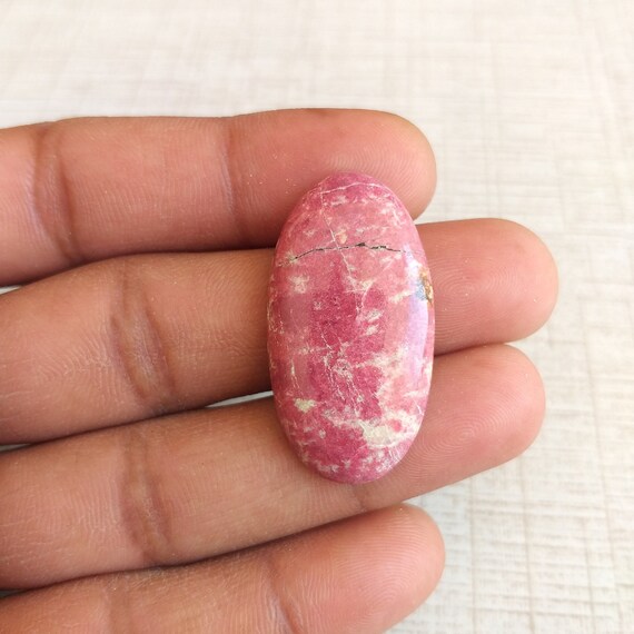 Oval Thulite Stone Cabochon: Pink Gemstone Pendant (36x19x6 Mm, 35.4 Carat) Oval Thulite Stone Cabochon: Pink Gemstone Pendant (36x19x6 Mm, 35.4 Carat)