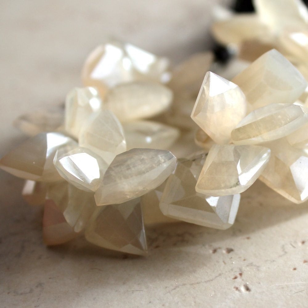 Ivory White Pearl Chalcedony Faceted Freeform Trapezoids 15 X 10mm - 4 Inch Strand Ivory White Pearl Chalcedony Faceted Freeform Trapezoids 15 X 10mm - 4 Inch Strand